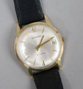 A 9ct gold Garrards automatic gentlemans wrist watch