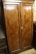 A two door mahogany wardrobe, H.191cm