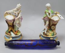 A pair of Paris porcelain figural bowls and a rolling pin