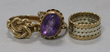 Two 9ct gold rings and an amethyst and gold ring