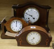 An Edwardian brass-mounted and line-inlaid mantel clock in architectural case and two smaller