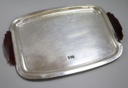 An Art Deco white metal rounded rectangular tray with red Bakelite handles (one a.f) 25.9oz gross,