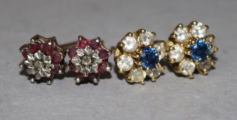 A pair of 18ct gold, sapphire and diamond cluster stud earrings and a similar pair of 9ct gold, ruby