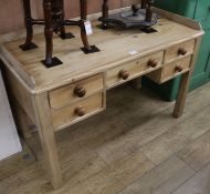 A Victorian stripped pine dressing table, W.122cm