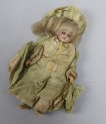 A Jumeau bisque head doll