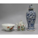 A Chinese blue and white vase and cover, a small canton teapot and a polychrome-decorated bowl