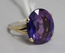 A purple and blue colour change stone ring