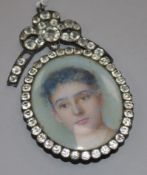 An Edwardian oil on ivory miniature, portrait of a lady, in a Georgian paste set silver frame, 4.5 x