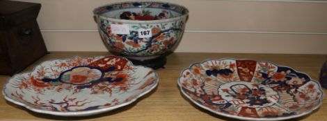 An Imari bowl and two dishes