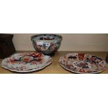 An Imari bowl and two dishes