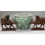 A pair of Chinese buffalo and a Chinese pot