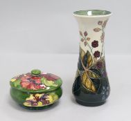 A Moorcroft 'Bramble' pattern vase, designer Sally Tuffin, 1998, H 8.25in (21cm) and a Hibiscus