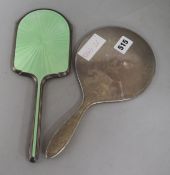 Two silver backed hand mirrors