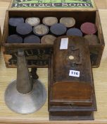 An Edison phonograph (gem) and phonograph rolls