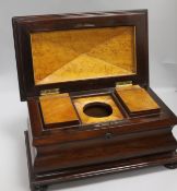 A rosewood sarcophagus tea caddy