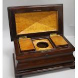 A rosewood sarcophagus tea caddy