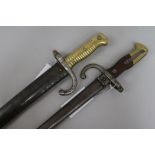 Two French bayonets; a M1866 pattern Yataghan sword bayonet, the blade etched ... d'Oumes de St.