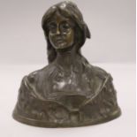 A bronze of a lady