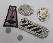 Two German badges and Linsignia and two Nazi coins