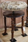 A revolving piano stool, H.55cm