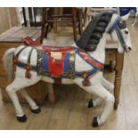 A carved and painted carousel horse, attributed to Philadelphia Toboggan Company, H.108cm