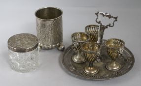 A Victorian silver egg cruet stand, lacking one cup, 16.8oz., A Victorian silver lidded glass jar