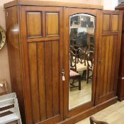 A mahogany triple wardrobe, W.210cm