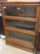 A three section globe-wernicke bookcase, W.125cm