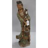 A Chinese polychrome-glazed terracotta figure of Guanyin, with ruyi sceptre and basket (some