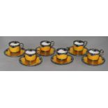 A set of six Royal Worcester silver-mounted coffee cans and saucers, with six enamelled silver-