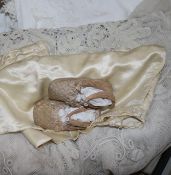 A lace bedcover, mixed table linens etc