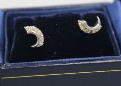 A pair of 18ct gold and diamond earrings