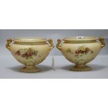 A pair of Royal Worcester blush ivory two-handled vases