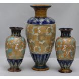 A large Royal Doulton Slater's patent vase and a pair of similar smaller