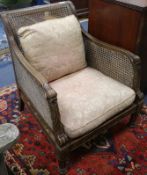 A pair of bergere armchairs