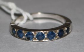 An 18ct white gold seven stone sapphire ring