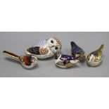 A collection of Crown Derby birds and an owl