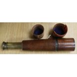 A three drawer telescope 'Reconditioned for John Barker & Co Ltd by Broadhurst Clarkson & Co'