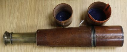 A three drawer telescope 'Reconditioned for John Barker & Co Ltd by Broadhurst Clarkson & Co'