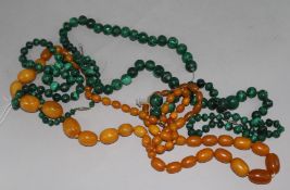 Three malachite bead necklaces and two amberoid bead necklaces