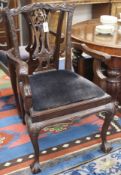 A set of eight Chippendale style chairs