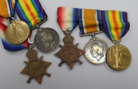 Two WWI groups of three medals