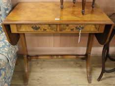 A Regency style banded walnut sofa table, W.86cm