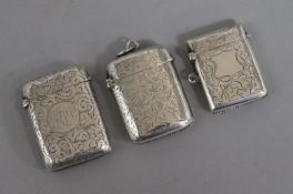 Three silver vesta cases