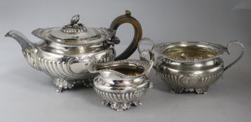 A George III silver three-piece tea service, London 1815, maker probably Joseph Angell