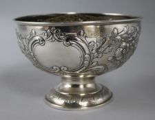 An Edwardian repousse silver rose bowl by Charles Stuart Harris & Son, London, 1907, 20.3cm, 11.5