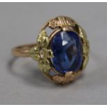 A post 1958 Soviet two colour 583 standard gold and synthetic sapphire dress ring, size O.