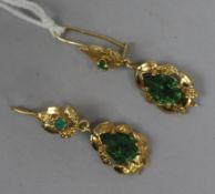 A pair of 18ct gold and green paste set drop errings.