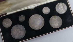 A cased Victoria 1887 seven piece specimen silver coin set, crown-3d