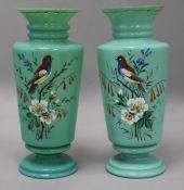 A pair of Victorian pale blue glass enamelled vases